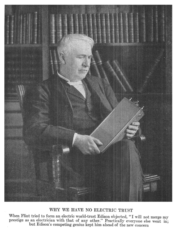 Picture of Thomas A. Edison holding one of his inventions from System: Magazine of Business.