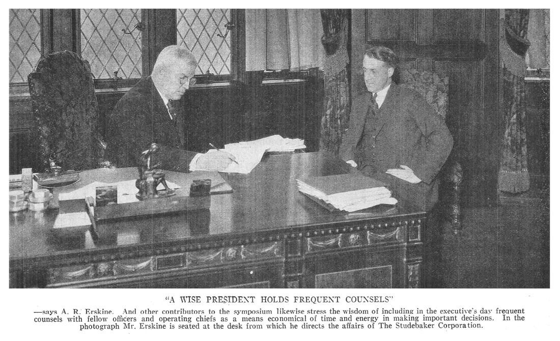 Image of A. (Albert) R. Erskine at his desk in 1925.