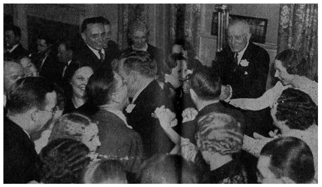 Picture of Thomas J. Watson Sr. dancing with his wife and employees.