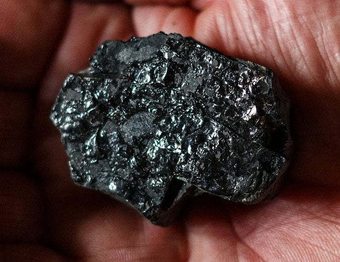 Picture of lump of coal. Human beings are not lumps of coal.