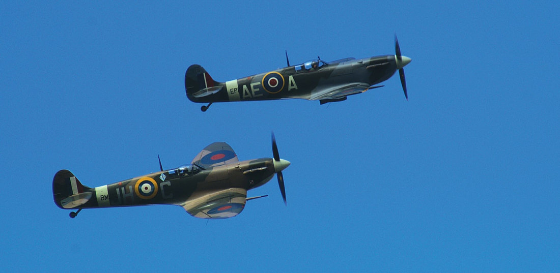 Picture of two British Spitfires.