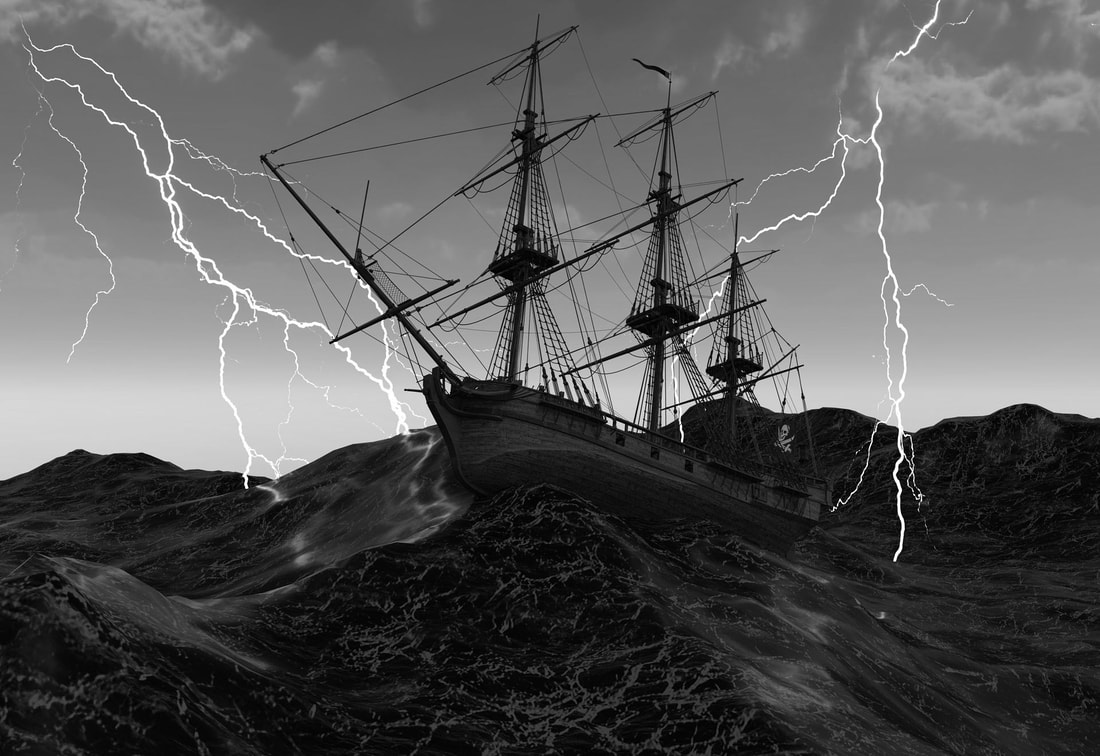 Picture of a ship at sea in a storm.