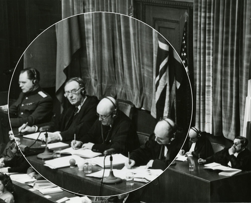 A high-quality, black-and-white image showing usage of IBM's wireless translation device during Nuremberg Trials.